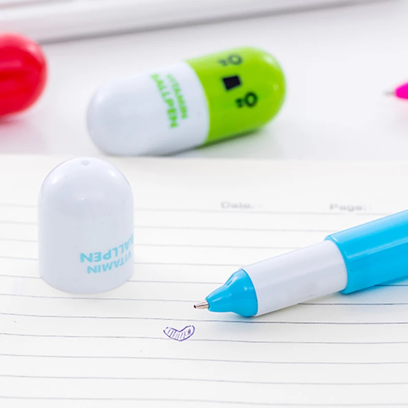 

6pcs Cute Smiling Face Pill Ball Point Pen Novelty Stationery Telescopic Capsule