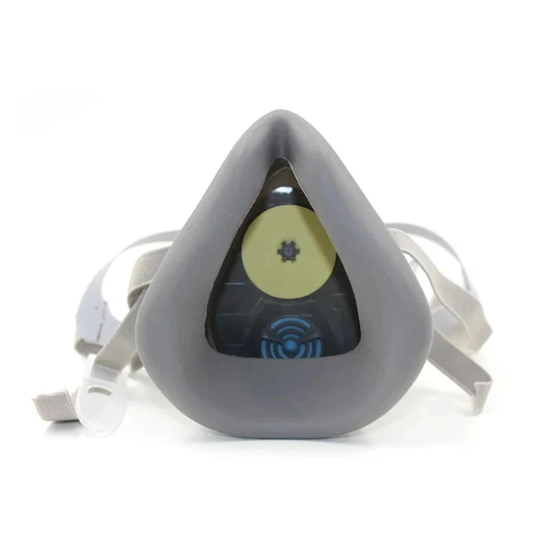 Détail du filtre à charbon amovible du masque respiratoire chimique, idéal pour se protéger des gaz et poussières lors de peinture