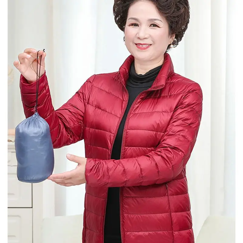 Out-of-season middle-aged and elderly women's light down jacket mother loaded with extra large size warm loose short coat fat.