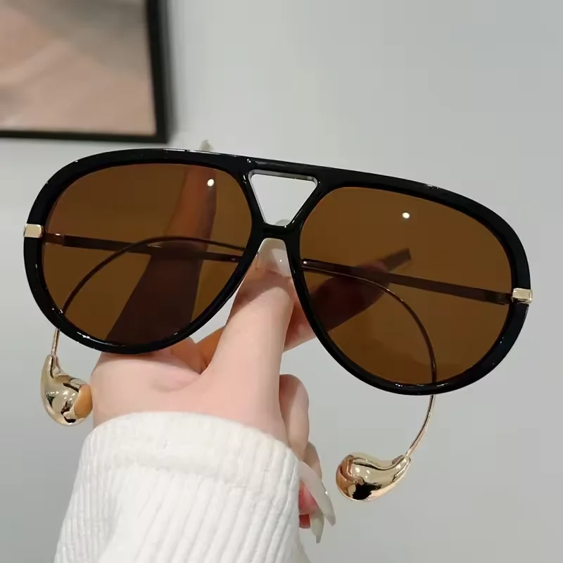 Designer oversized sunglasses with punk style double bridge.