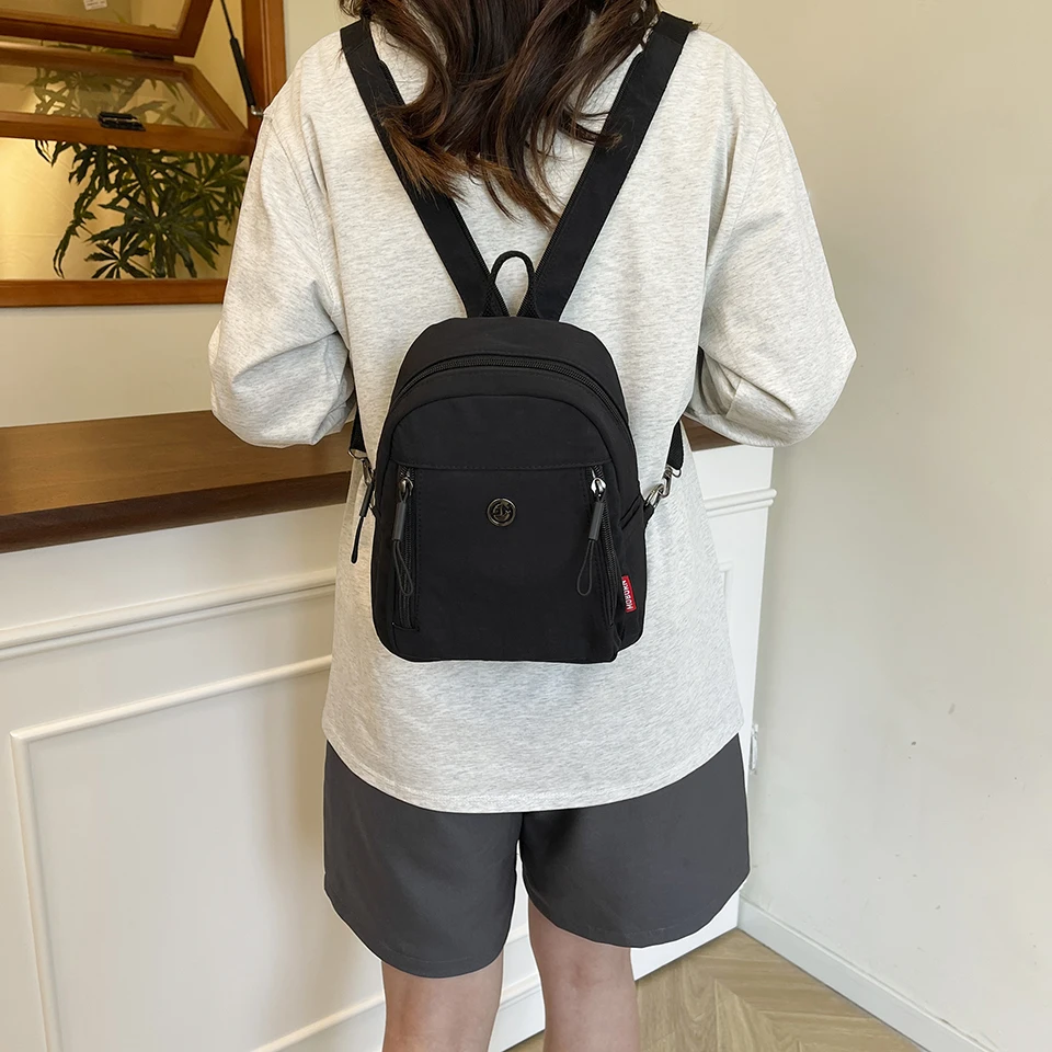 Mehrfarbiger Nylon-Mini-Rucksack, modische und vielseitige kleine Damentasche, lässiger Reise-Multifunktionsrucksack – Detail 11