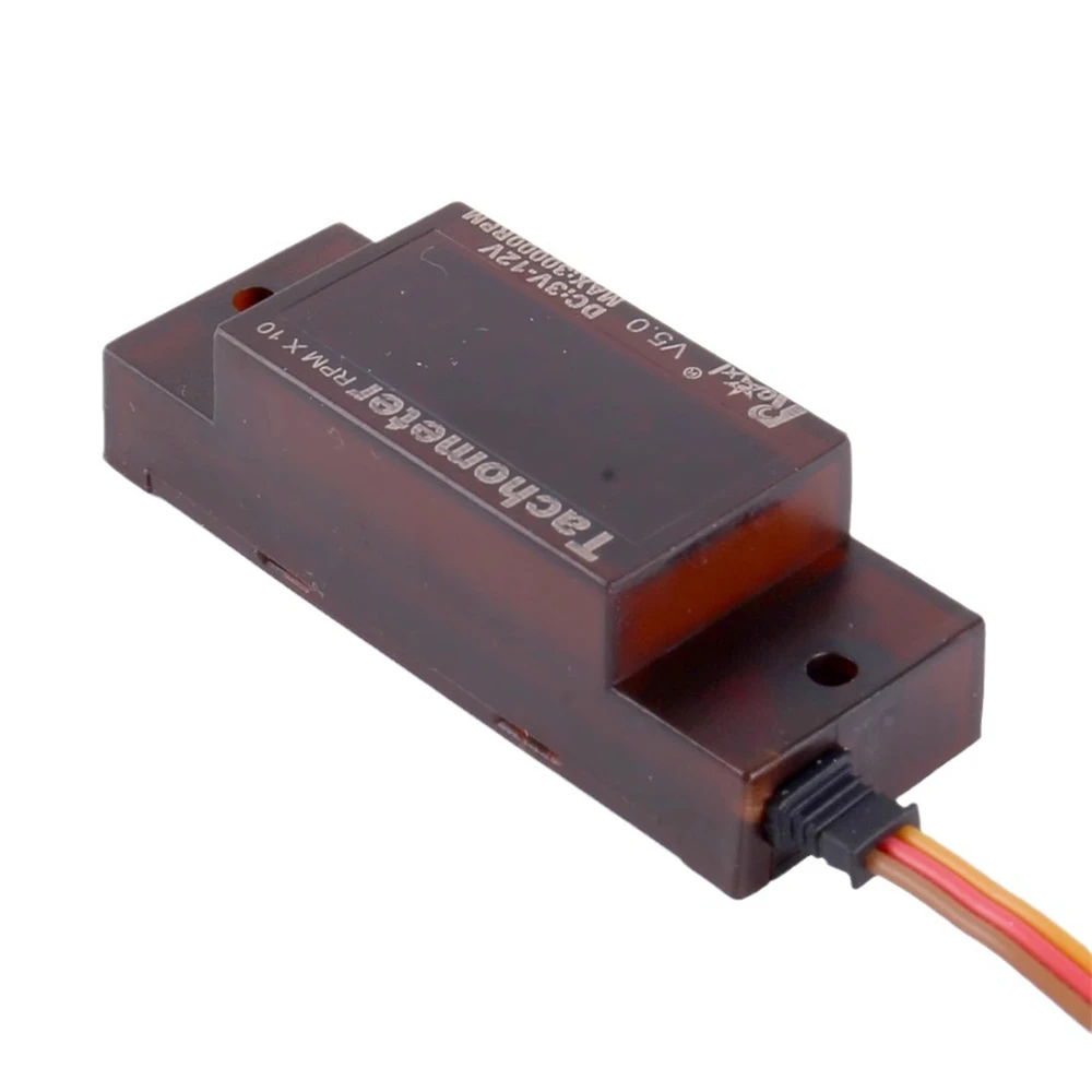 Détail du boîtier noir de l'allumeur RC pour moteur essence DLE Rcexl - 30000 tr/min