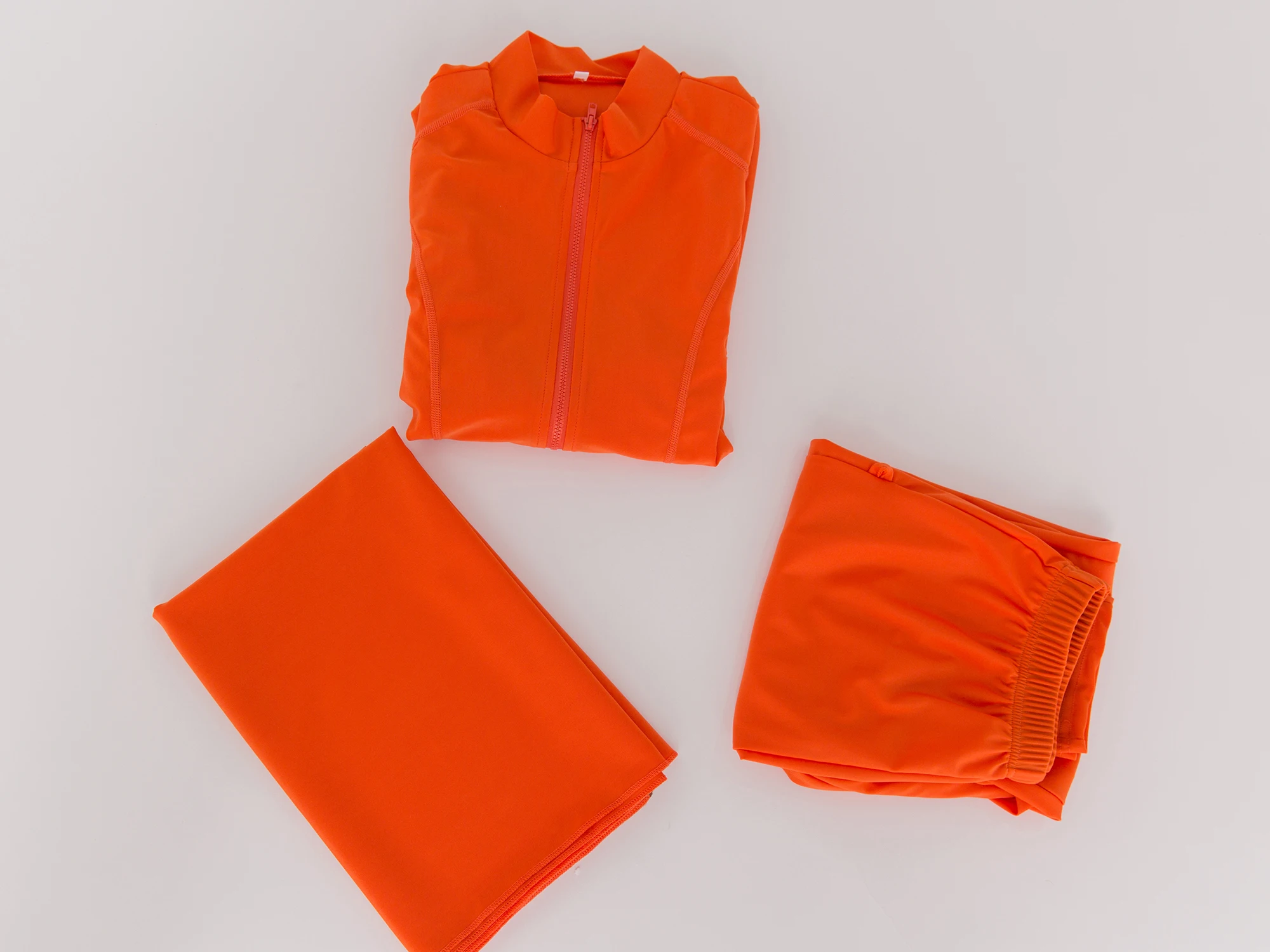 Close-up of zipper and stitching detail on the modest swim tunic