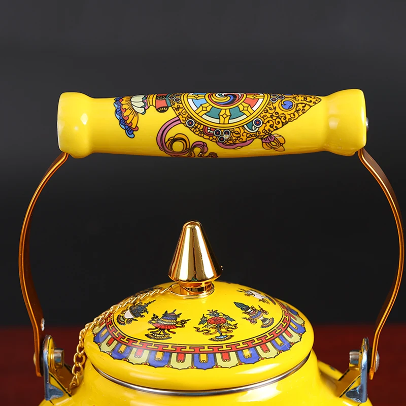 https://ae01.alicdn.com/kf/Sf587d6cbe6b5415399a6c9bee3ec2bd8S/Enameled-Teakettle-with-Ceramic-Handle-Tibet-good-luck-yellowTea-Kettle-for-Stovetop-induction-cooke-Hot-Water.jpg