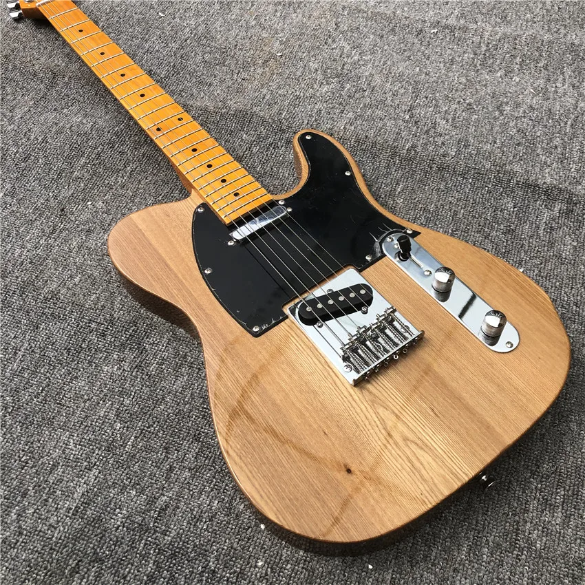 

Elm electric guitar, log color, cow bone string pillow, real photos, free shipping, wholesale and retail