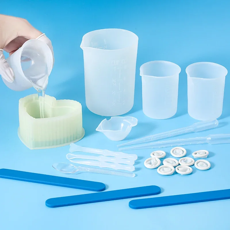 Versatile Resin Mixing Set: Non-Stick Silicone Mat, Measuring Cups, Stirring Rods, and Spoons