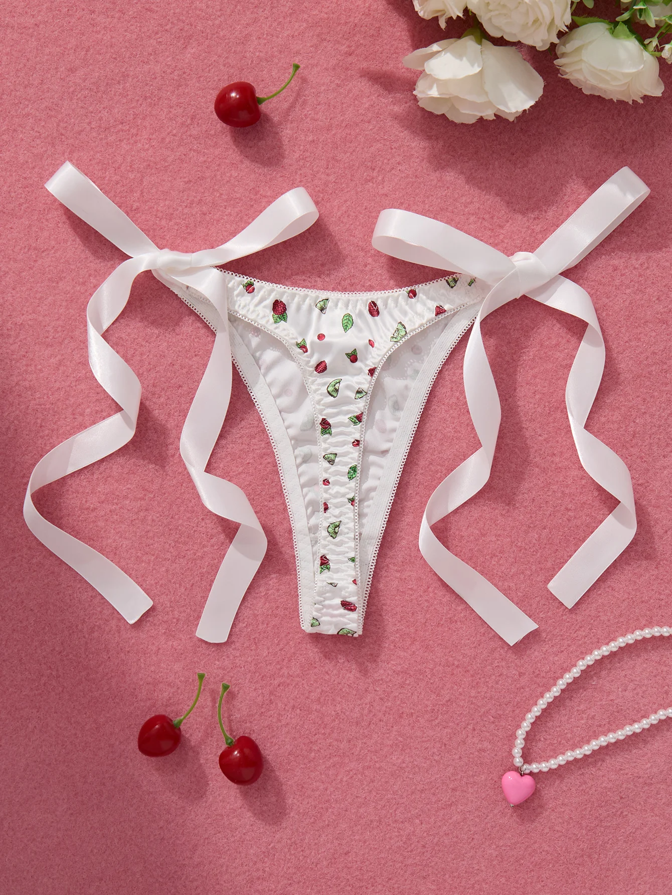 ribbon tie detail on floral thong