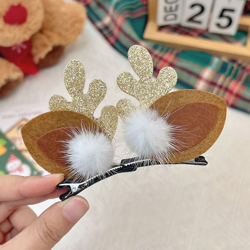 Glitter gold antler pom pom alligator hair clip