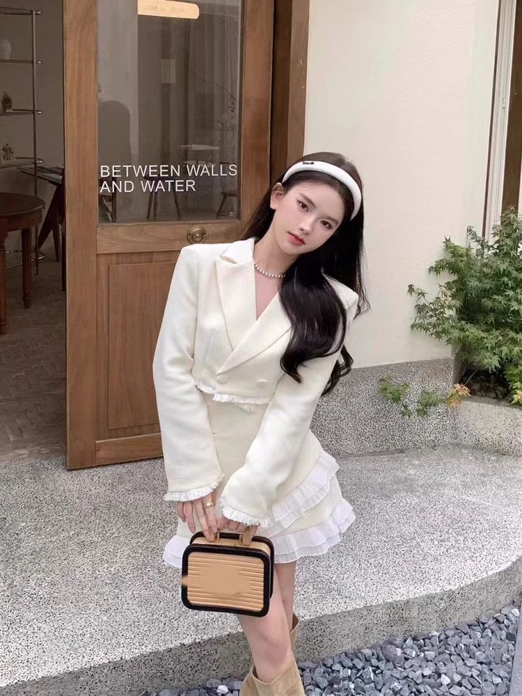 Conjunto de falda de dos piezas de lujo para mujer, chaqueta corta con solapa y volantes, minifalda ajustada de retazos, moda coreana, otoño