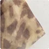 تنورة نسائية متوسطة الطول من جلد النمر ، حزام خصر طويل مطاطي عالي ، تنورات صيفية على الموضة ، تنورات خصر