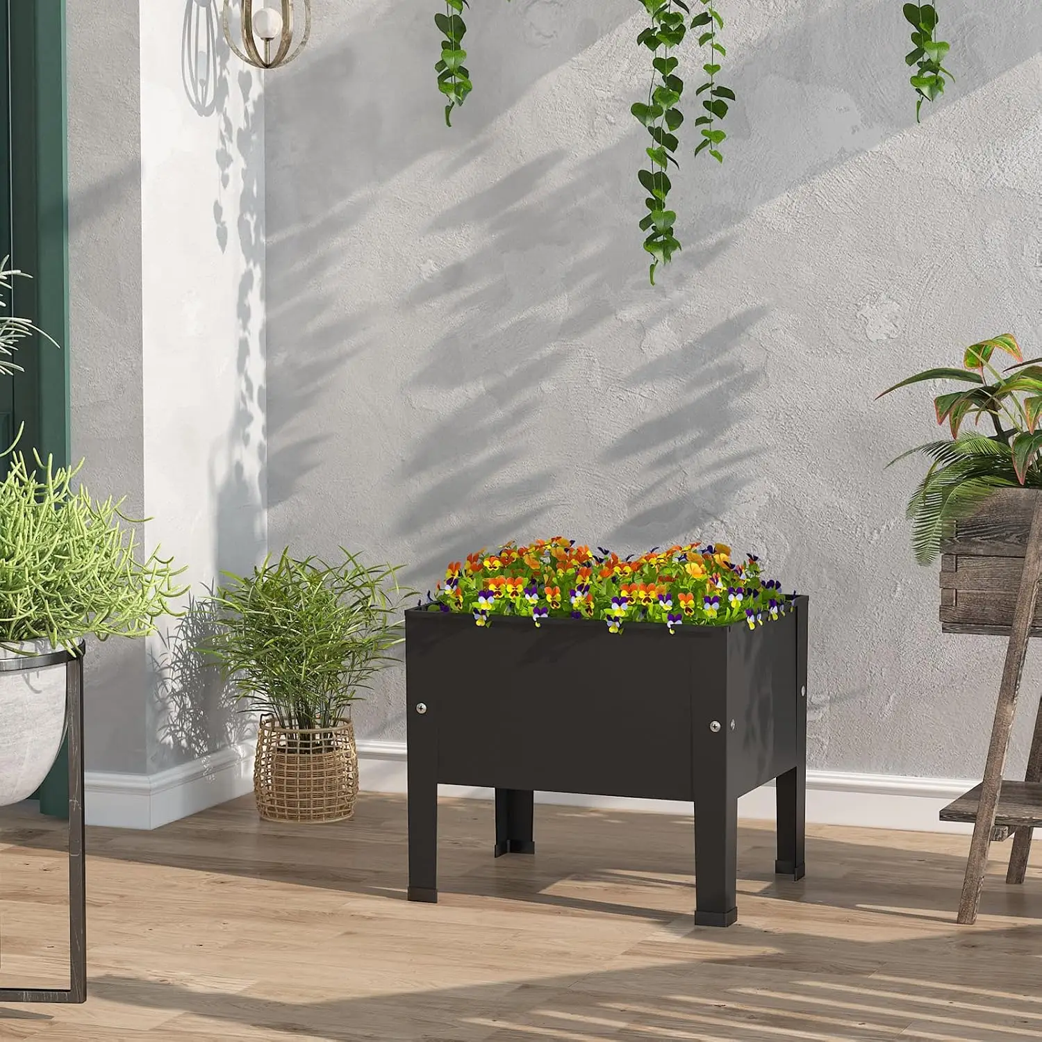 Black metal planter box with legs