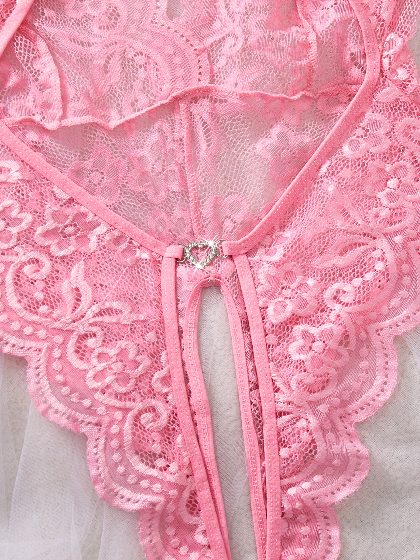 bow detail on the lace bodysuit