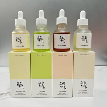 L'essenza di lumaca al ginseng di bellezza coreana illumina il tono della pelle idratante ripara la pelle opaca schiarisce le linee sottili antirughe 1