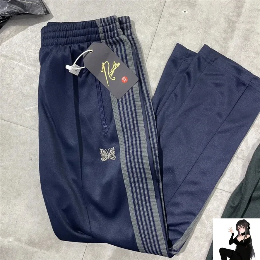 

Y2K BOOT-CUT Needles Track Pants Men Women High Quality Poly Smooth Needles Pants Butterfly Logo Knitted Purple Stripe Trousers