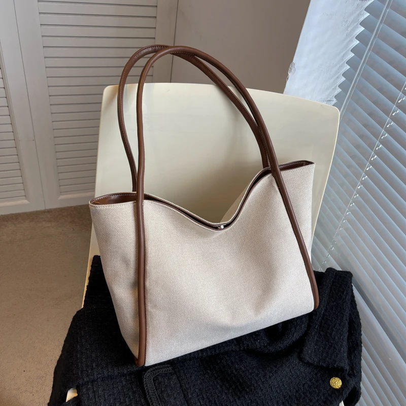 قطعة واحدة من حقيبة اليد ذات السعة الكبيرة، حقيبة دلو عصرية للعمل والتنقل، يمكن للنساء أن تحمل iPad