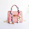2023 New Fashion Niche Square Patterned Embossed Scarf Decoration V-pattern Tassel Lock Chain Single Shoulder Small Square Bag