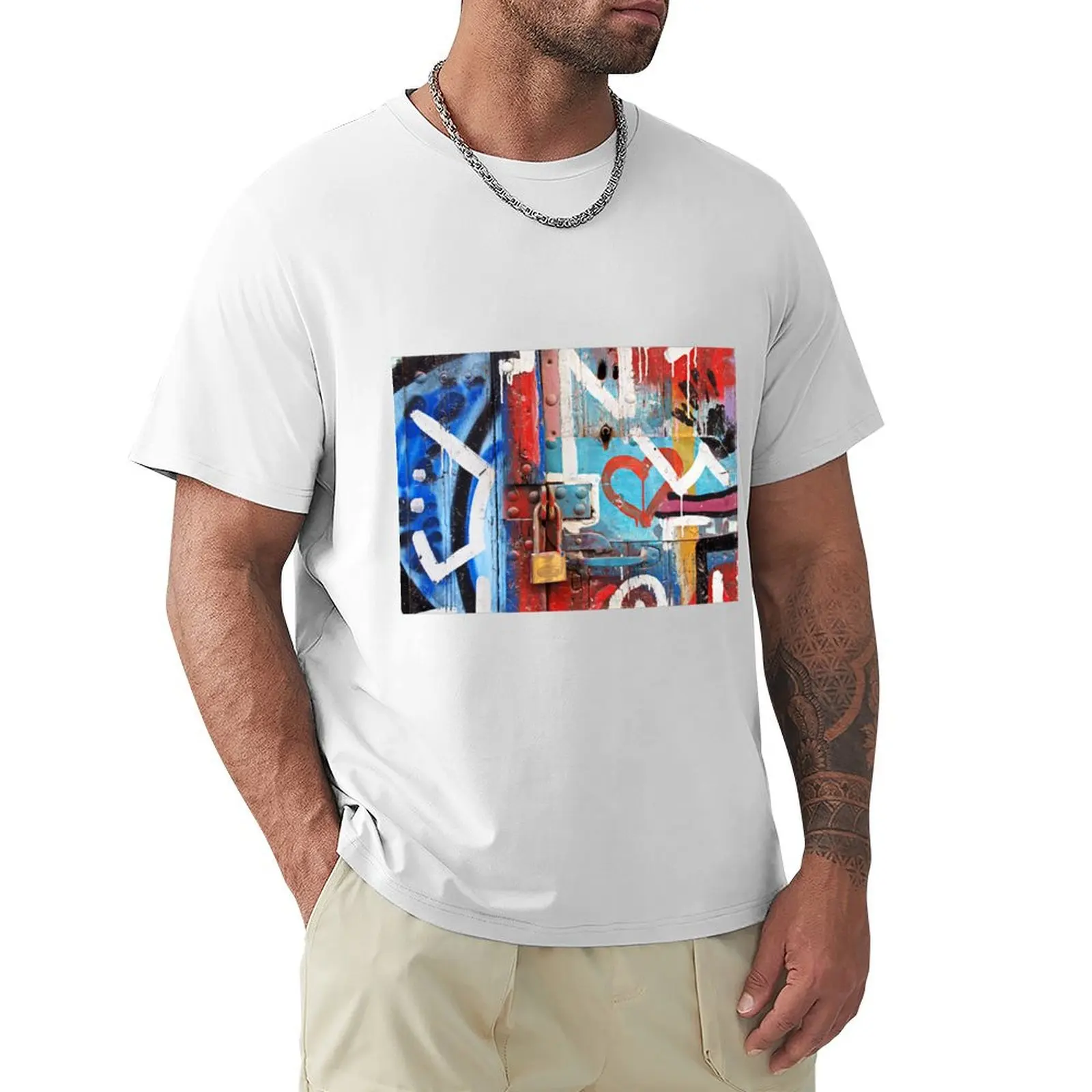 

Vibrant graffiti on old door with lock. T-Shirt quick-drying kawaii clothes black t shirts for men