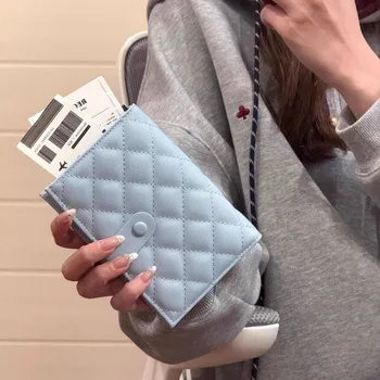 Portafoglio Multifunzionale da Viaggio per Carte di Credito, Elegante Porta Passaporto per Donne, Custodia in Pelle con Chiusura a Scatto