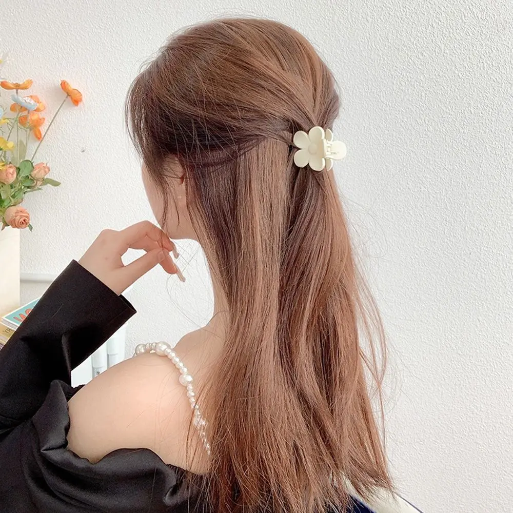Description Picture 3 of itemCute Temperament Matte Plastic Solid Color Flower Hair Claw Women Hair Accessories Korean Style Hair Clip Ponytail Holder