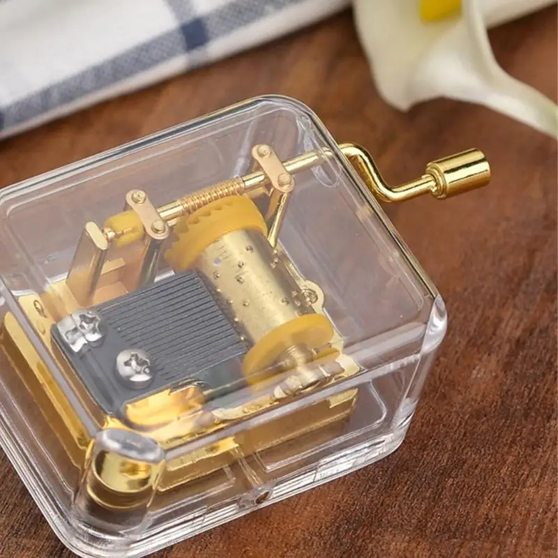 Clear Acrylic Mini Music Box with Hand Crank Mechanism Wind Up Musical Box Accessories for Home Decoration and Gifting KXRE