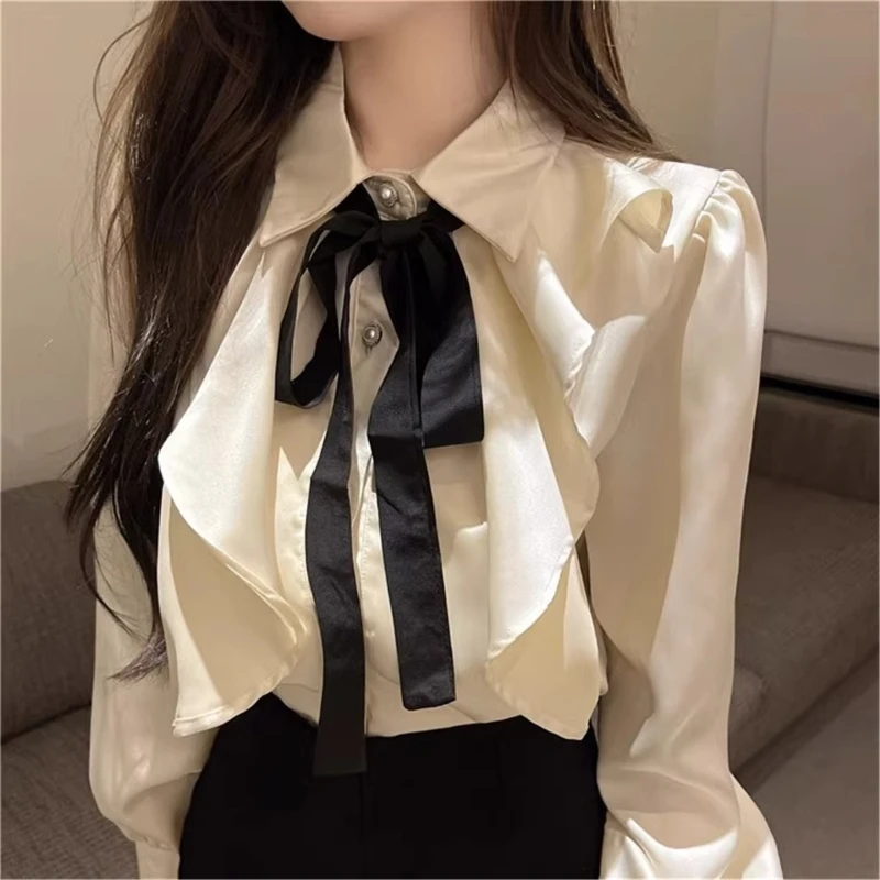 

Fashion forward Women's Shirt with Bow Tie Collar and Ruffled Hem Long Sleeve