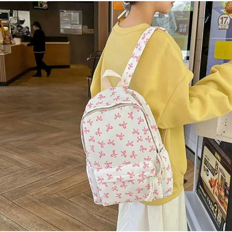 Stylish Bow Print School Backpack with Laptop Compartment and Adjustable Straps - Ideal Back-to-School Gift