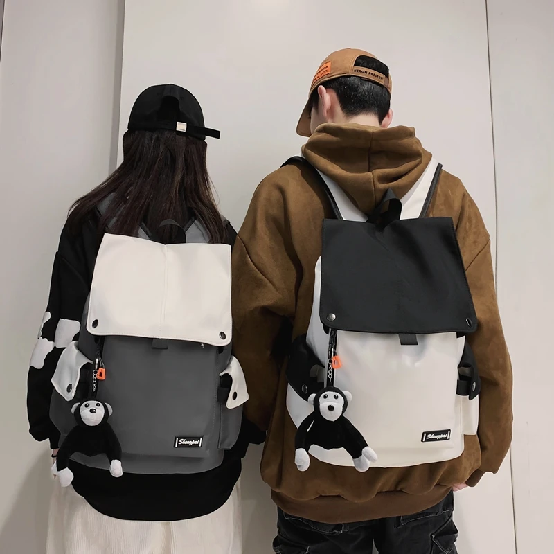 Flip color blocking large capacity computer bag Student couple trend