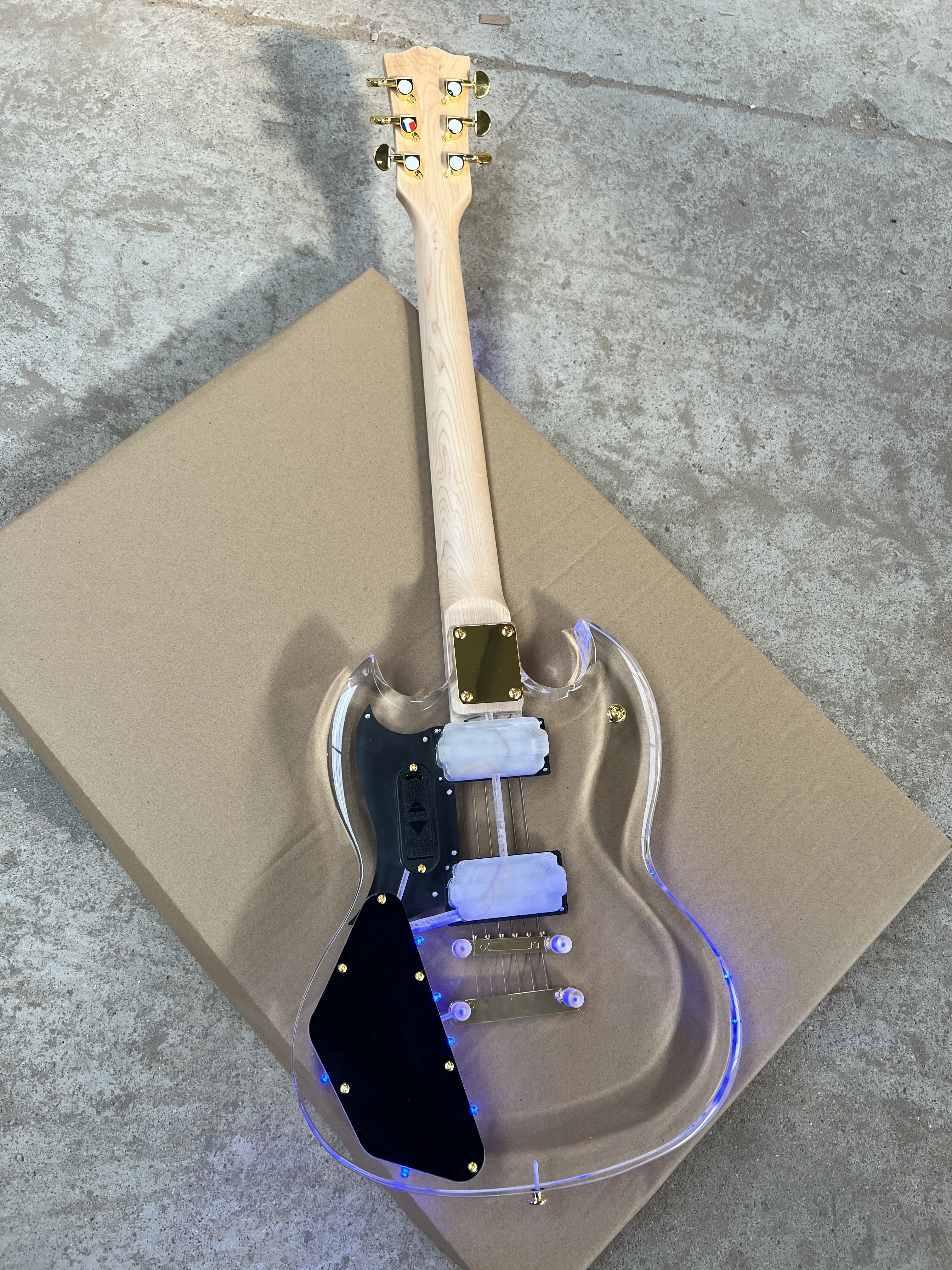 High-quality acrylic Plexiglass clear 6-string electric guitar Blue led lights Gold accessories Free shipping