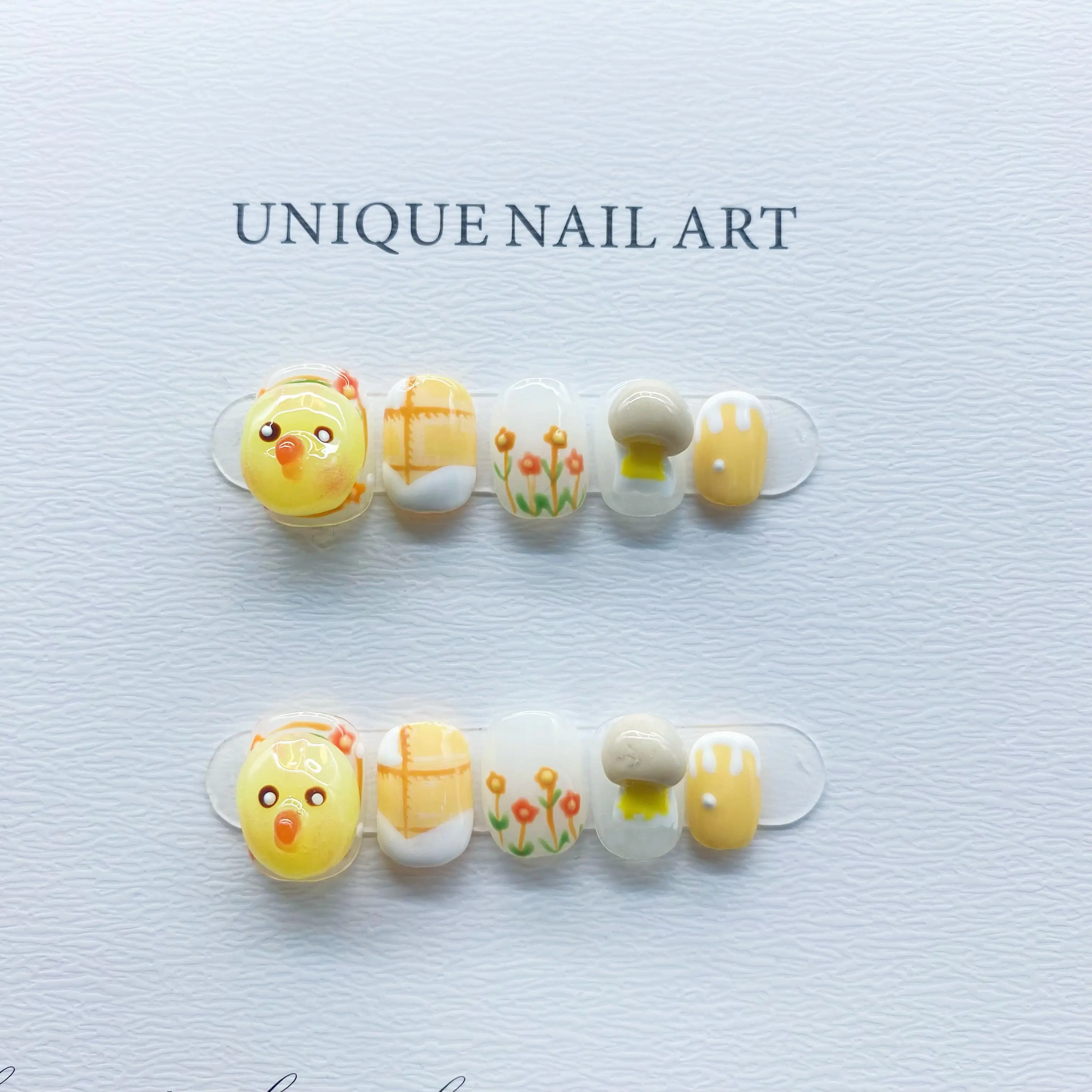 

Wholesale Cute Zodiac Chicken Hand-Sculpted Carving Detachable High-Quality Whitening Handmade Press On Nails.No.D135