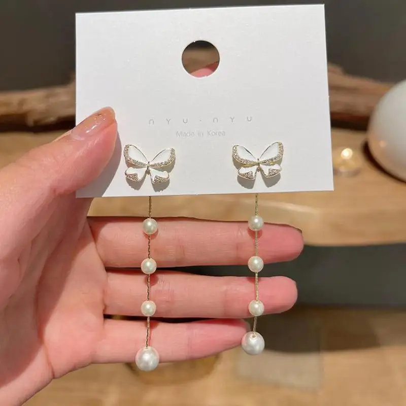 Милые серьги для девушек, распродажа, Корейская версия, с бантом, кисточкой и жемчугом, темпераментные серьги для невесты, маленькая толпа, искусственные Роскошные серьги для одного и двух вещей