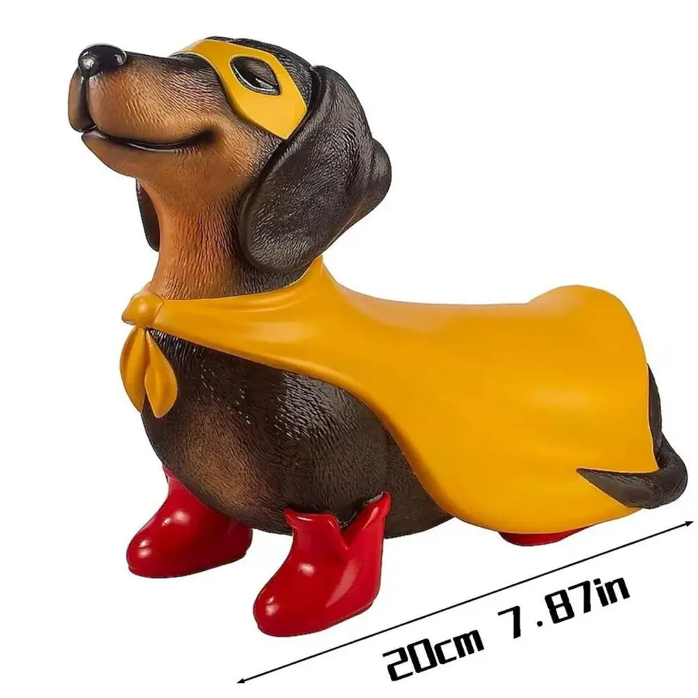 Superhero Dachshund statue wearing yellow cape and red boots for Halloween tabletop home decor