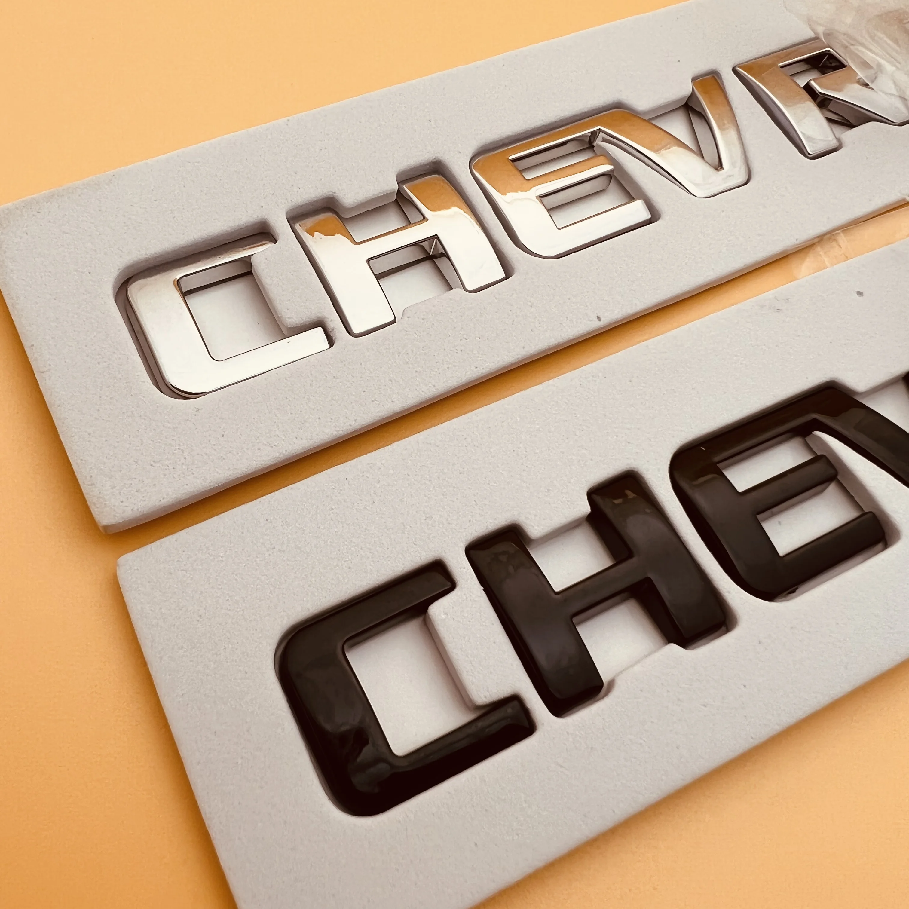 

1pcs Size:195mmX18mm silver ABS Chevrolet Lecci front and rear logo Shanghai GM Wuling logo SPK letter logo trunk CHEV Stickers