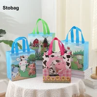StoBag 4pcs Cartoon Non-woven Gift Tote Bags Kids Child Fabric Candy Package Waterproof Storage Reusable Pouch Birthday Party 1