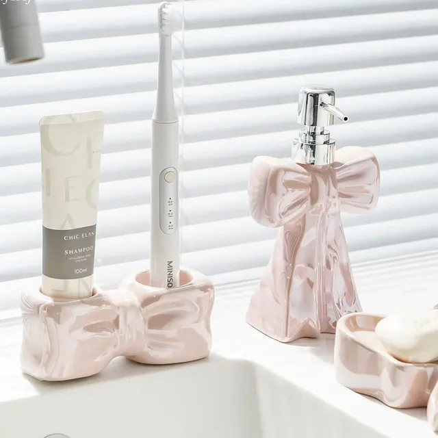 Creative โบว์ขวดโลชั่นแปรงสีฟันไฟฟ้าชั้นวางแปรงสีฟันยาสีฟันชั้นวางห้องน้ําอ่างล้างหน้าฐานเก็บถ้วย 1