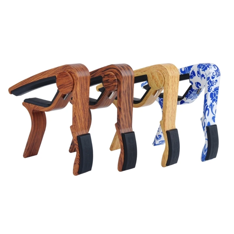 

Dropship Guitar Tuning Clamp Quick-Change Guitar Capo Clip for Guitar and Ukulele