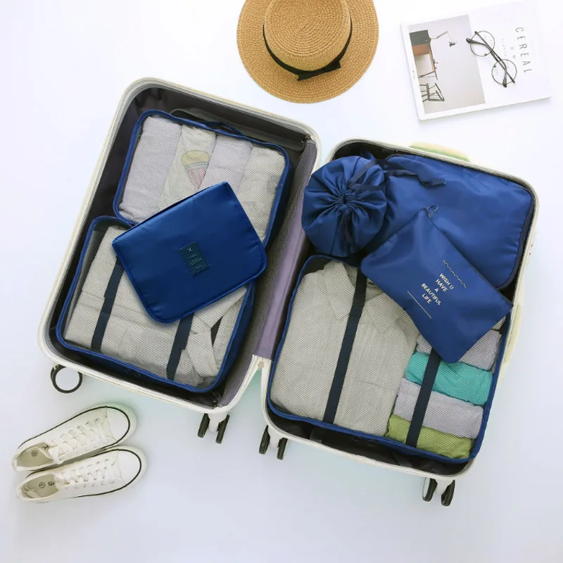 https://ae01.alicdn.com/kf/Sf764fadf08e64e5dace658ae6d62ba5ca/Travel-Storage-Organizer-Small-Bag-Clothes-Cosmetic-Makeup-Pouch-Ziplock-Bag-In-Suitcase-Travel-Accessories-Essentials.jpg