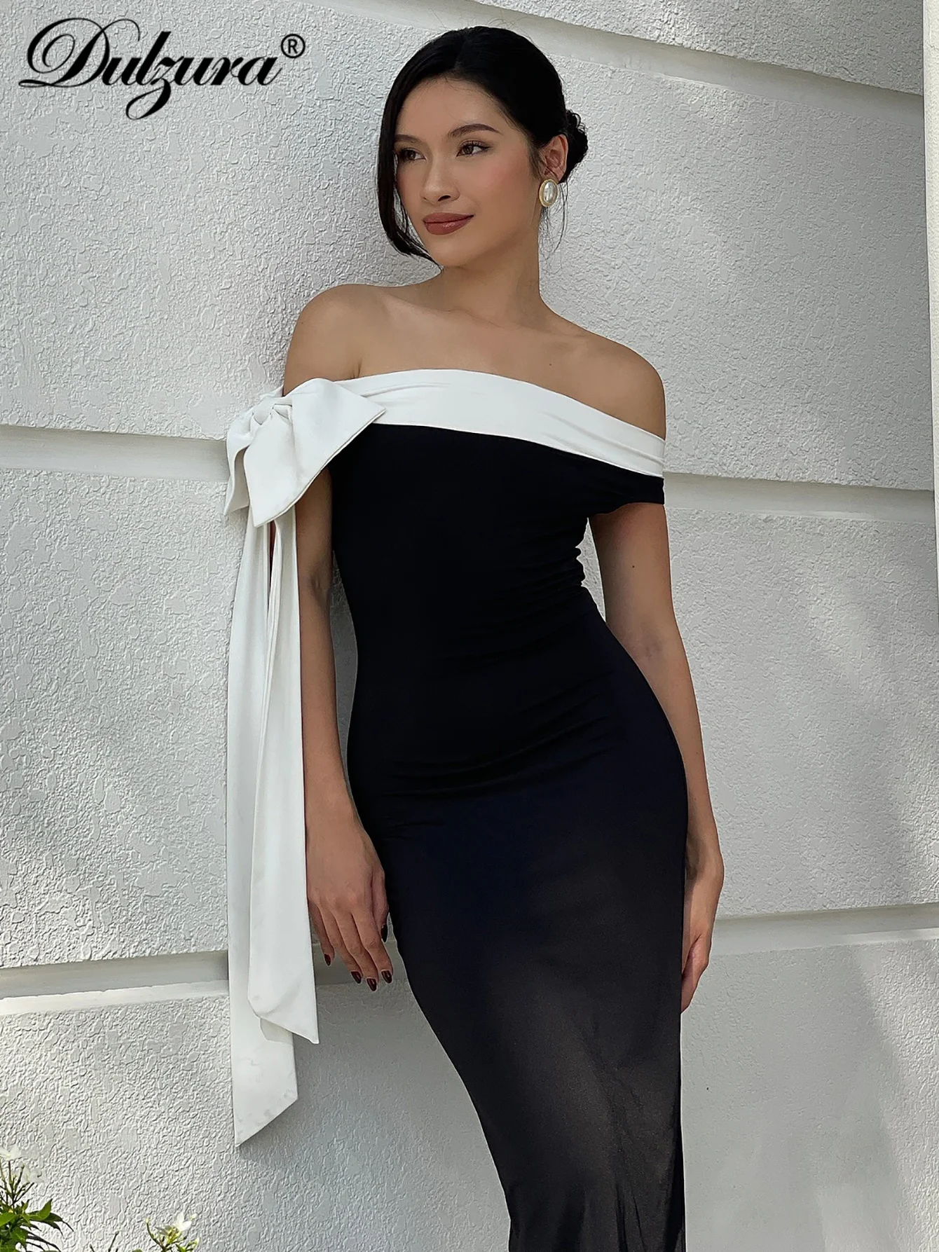 فستان دولزورا طويل بدون أكتاف بدون أكمام مع فيونكة...