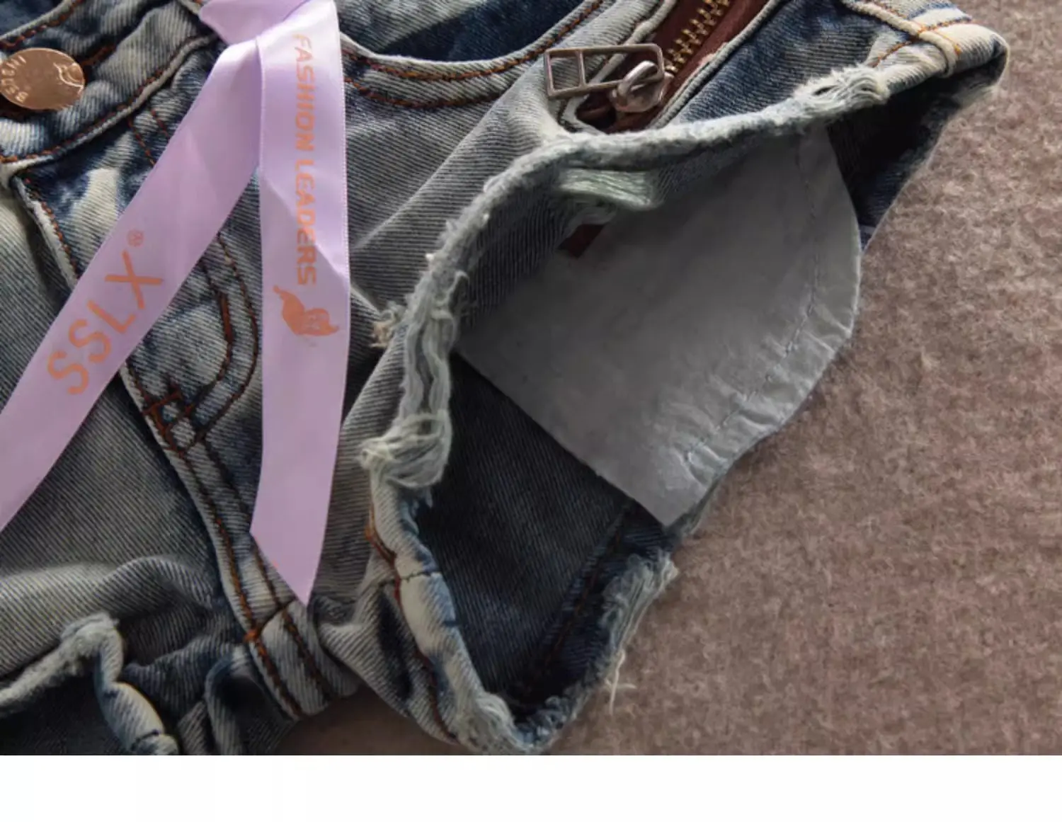 Zynvora Denim Shorts detail of fake zipper