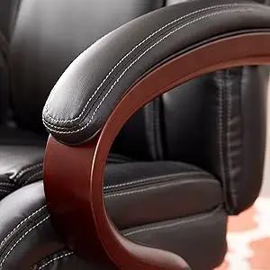 Close up of the arm, upholstered with bonded leather