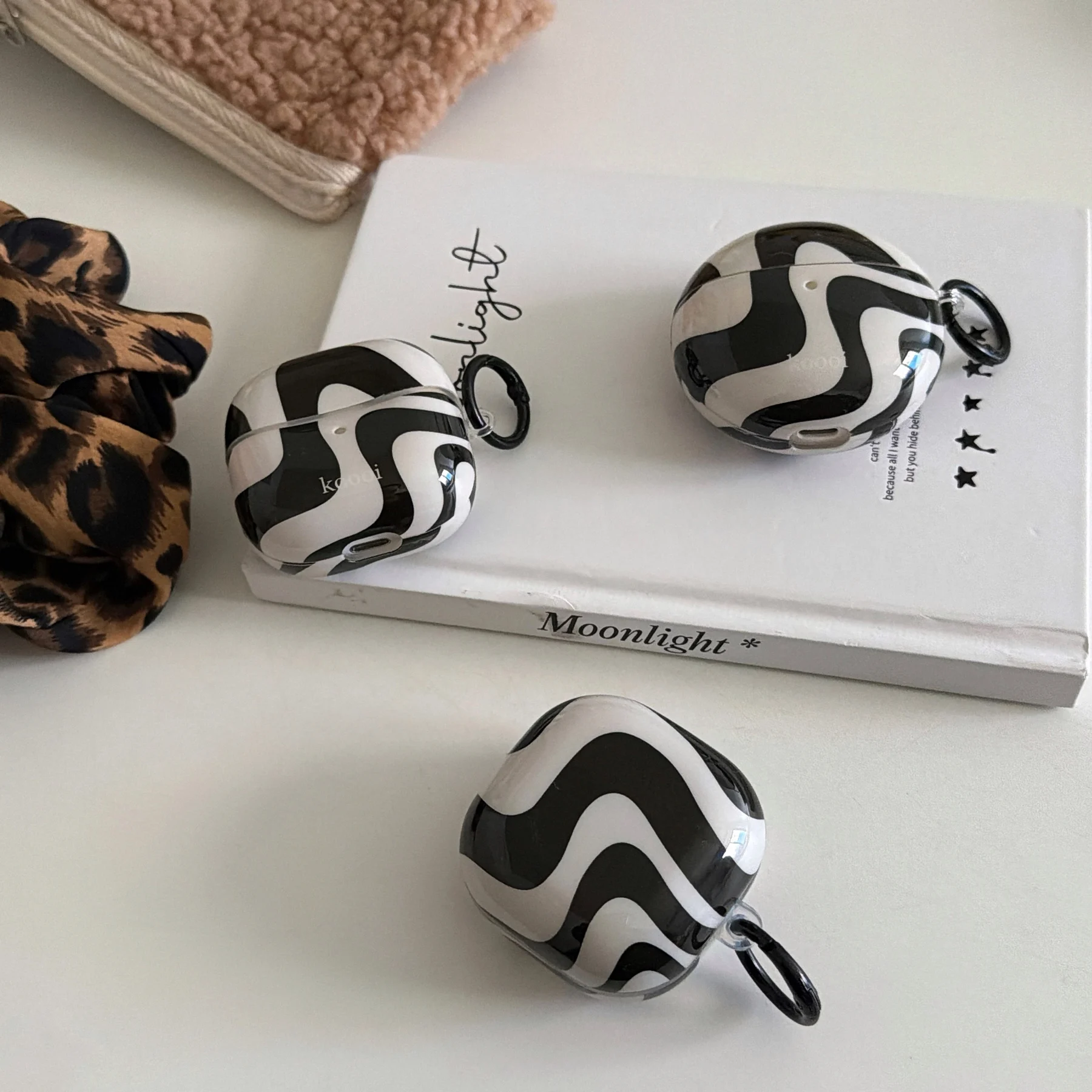 Sleek Black & White Glossy Earphone Protection Cover – Stylish Soft Shell Inspired by Korean Design