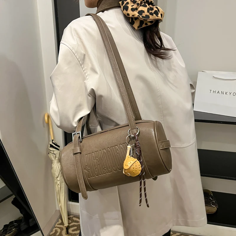 Multifunctional Cylinder Shaped Shoulder Bags For Women 2025 Latest Designer Handbags Luxury Cross Body Bag With Pendant