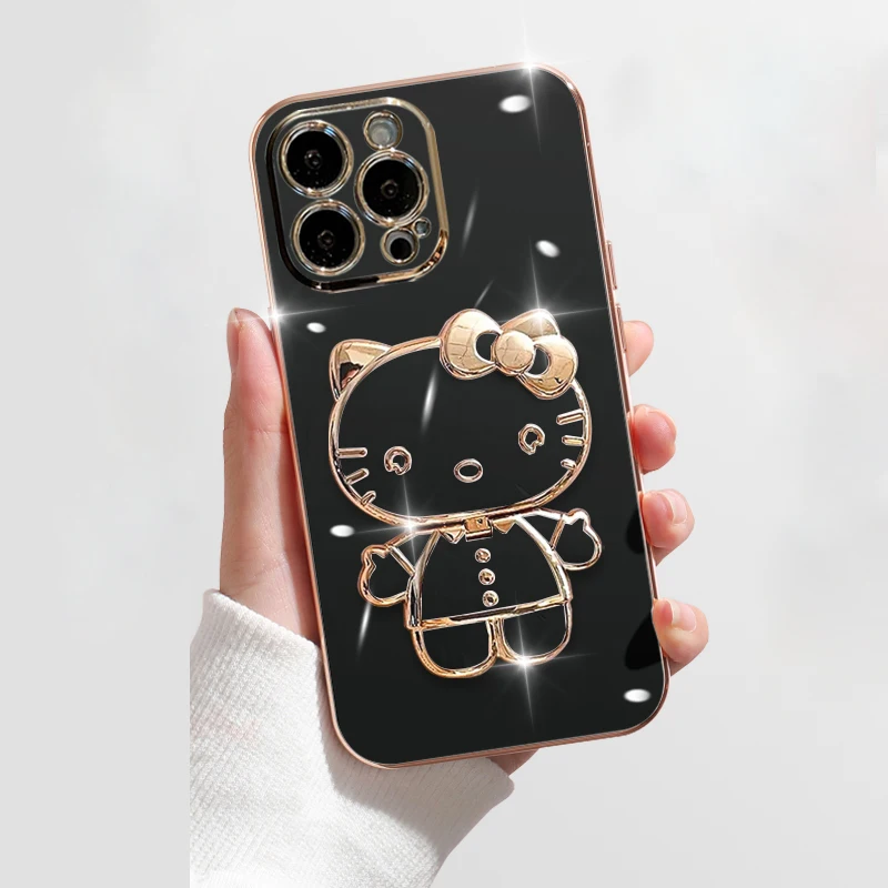 thumbnail image 1 of Funda de lujo con soporte de espejo de Hello Kitty para iPhone 14, 11 Pro Max, 13, 12 Mini, XS, XR, X, 8, 7, 6S, 6 Plus, cubierta trasera de silicona suave, 1 of 5
