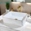 KEMAIDI 19" Ceramic White Vessel Sink with Gold Trim Porcelain Bathroom Marbled Rectangular Above Counter Bathroom Sink Faucet 1