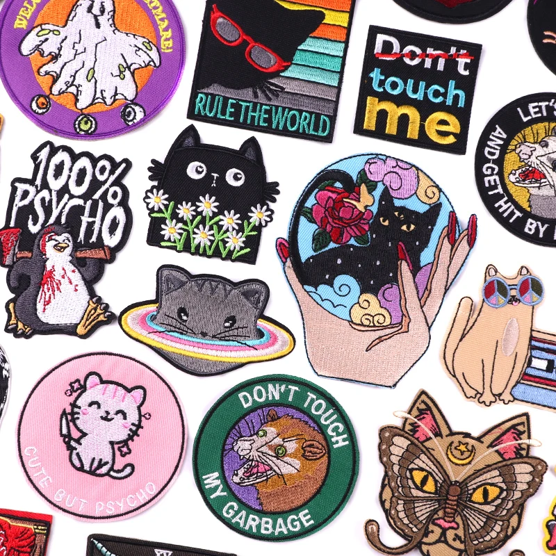 Collection of various colorful patches with different designs on a white background