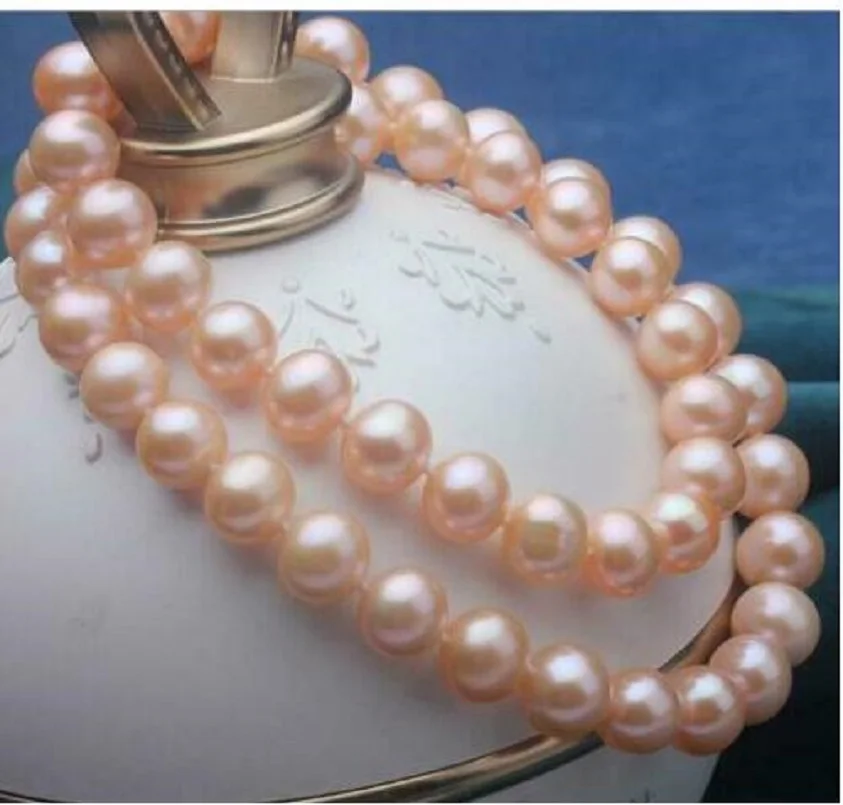 

Charming Natural AAAA10-11mm Round South China Sea Pink Pearl Necklace with 14K Gold Buckleuckle