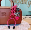 Keychain Cute Girl Butterfly Knot Hook Weaving Rope Cool Black Love Bag Pendant Pendant Mobile Phone Chain 1