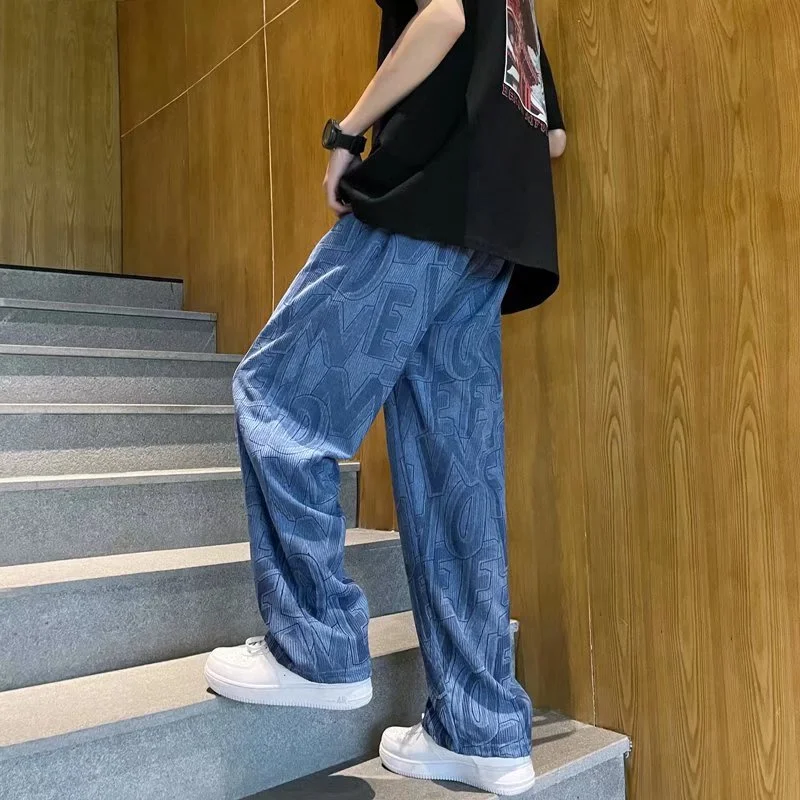 Jesień Streetwear Allover spodnie z nadrukiem sznurkiem Preppy Casual męskie Baggy pantalones Hip Hop proste spodnie dresowe luźne spodnie