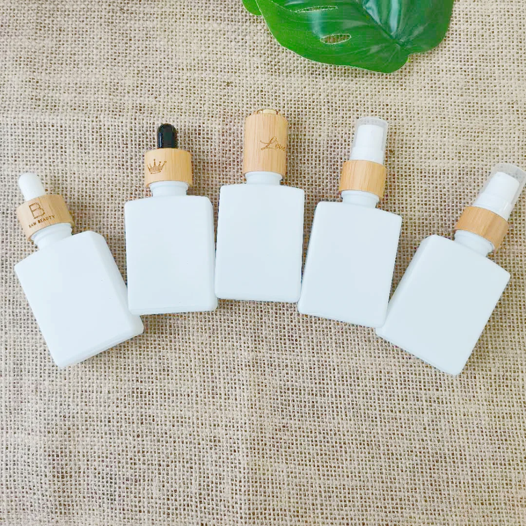 

Wholesale 30ml White Glass Essential Oil Dropper Bottle Serum Lotion Fine Mist Spray Pump Bottles Containers Skincare Packaging