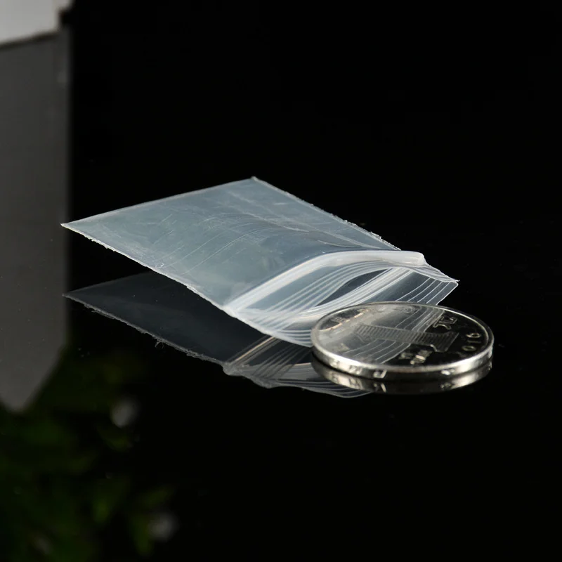 50 Stück 20-Draht-Verdickungs-Mini-Druckverschlussbeutel, transparent, klein, Kunststoff, Poly, für Pillen, Münzen, Schmuck, Aufbewahrung, kleine Unternehmen – Detail 2