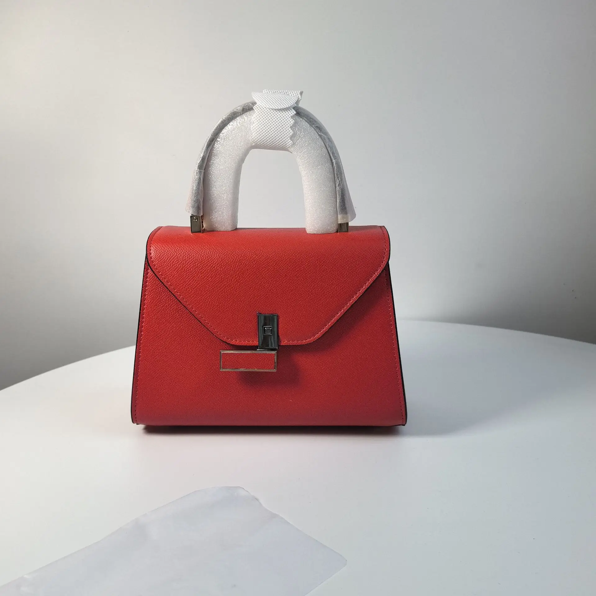 thumbnail image 1 of Bolso Kelly de piel auténtica nuevo de 2024, diseño de nicho, moderno y sencillo, con cierre, bolso cruzado de mano para mujer, 1 of 5